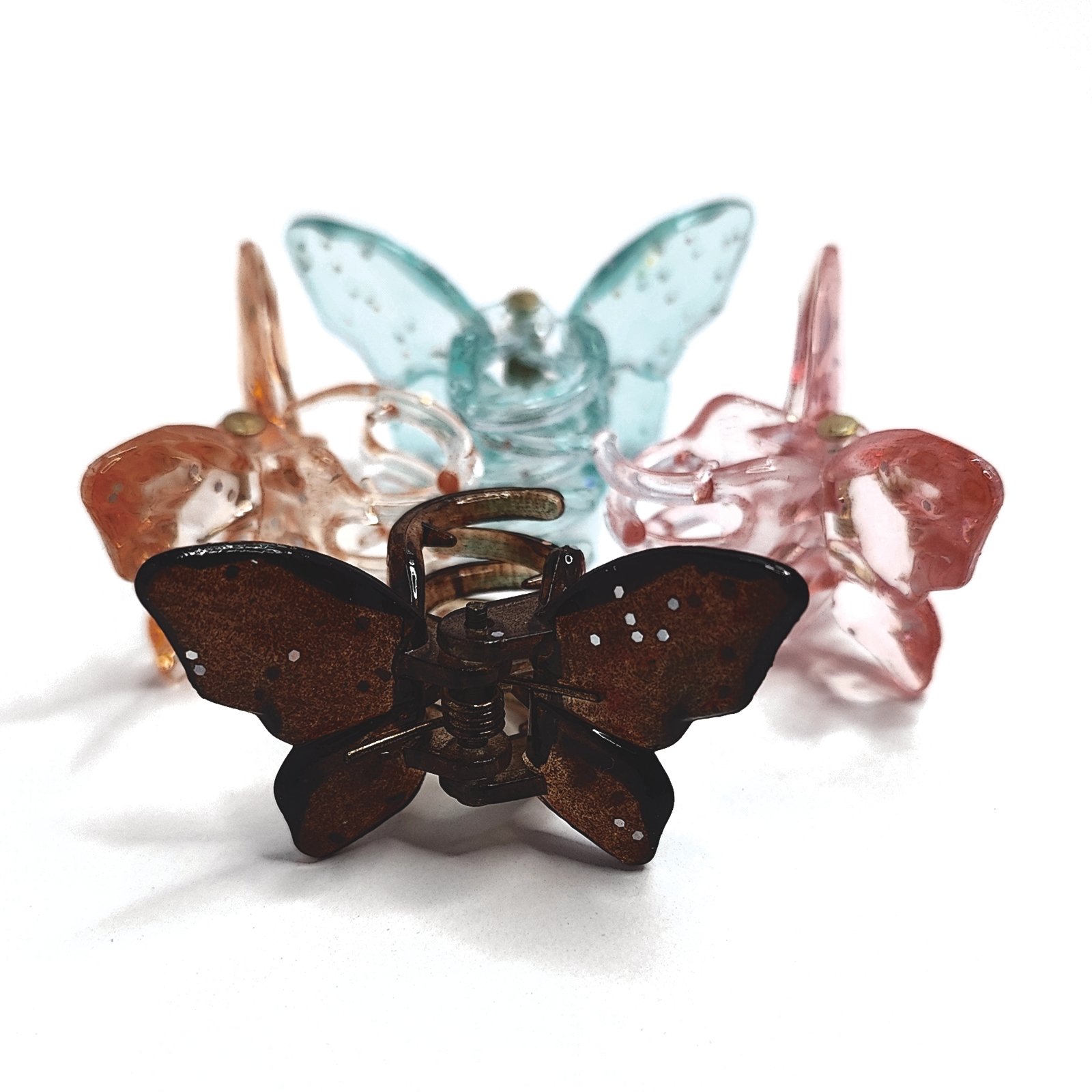 Set of 4 Vibrant Butterfly Sparkly Glitter Transparent Hair Clutchers - Image 4